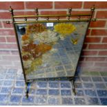 A 19th century brass mirrored fire screen with painted flowers and butterfly to glass,