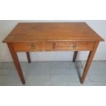 A 19th century writing table with two small drawers to one side,