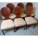 A set of six 19th century Biedermeier spoon back dining chairs in walnut,