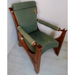 A Vienna secessionist style mahogany framed library/elbow chair upholstered in green material and