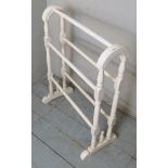 A single white painted towel rail,