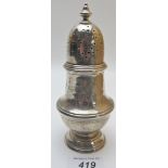 A silver sugar caster, London 1926, appr