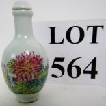 A Chinese porcelain snuff bottle and sto