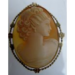 A cameo brooch/pendant, marked '9ct lust