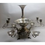 A large impressive silver centre piece, heavily embossed with flowers and shell design,