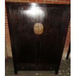 A large Chinese 20th marriage cupboard w