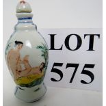 A Chinese erotic snuff bottle and stoppe