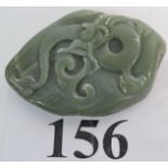 A Chinese carved Jade boulder, decorated