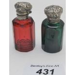 Two 19th century glass scent bottles, on