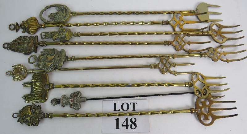 A collection of 9 vintage toasting forks