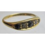 An 18ct gold sapphire and diamond ring,