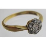 An 18ct gold diamond cluster ring, appro