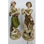 A pair of Royal Dux porcelain figures, c