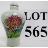 A Chinese porcelain snuff bottle and sto