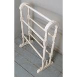 A single white painted towel rail, est: