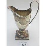 A Georgian silver helmet shaped jug, Lon