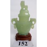 A finely carved Chinese Jade vase and co