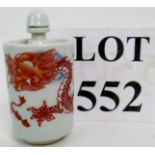 A Chinese porcelain snuff bottle and sto