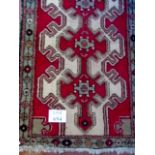 A small Saveh rug, mid 20th century (Karak) and a Teimuri 20th century fine bag,