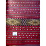 A possibly Moroccan Kilim rug, (182cm x 125cm), in good condition,