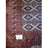An early-mid 20th century Persian rug on cream field, (160cm x 98cm approx),