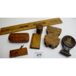 A collection of treen items, a wooden ruler and two pocket watch holders,