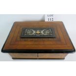 An elegant wooden stationary box with an intricately inlaid lid panel using floral and figural