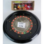 A vintage Roulette wheel, 49 cm diameter, brass mounted wooden framed, nicely weighted,