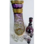 A tall glass vase with a floral pattern in silver & gilt clear at the base blending to purple at