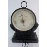 A 19th century Belgian aneroid barometer, brass cased circular form,