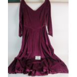 A medieval style velvet dress with silver coloured buttons, size 12/14 approx,