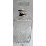 A heavy square cut glass whisky decanter with silver collar, London 1972,