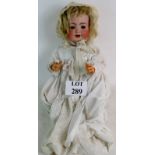 An early 20th century Simon & Halbig bisque head doll, `126 62', with blue glass sleeping eyes,
