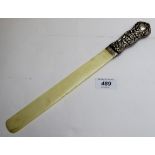 A silver handled ivory paper knife,
