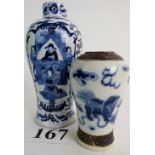 Two antique Chinese blue and white ceramic vases in the Kangxi taste, likely 19th century,