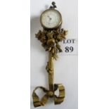 A fine 19th century French wall clock with bronze figure above the hand painted enamel dial and