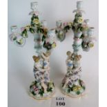 Pair of four branch ceramic candelabra with Mothers holding an infant child and profuse oversize