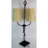 A table lamp with wrought iron style base and twin light shades, 87cm tall,