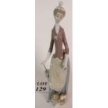A tall Lladro figure, Dama del bulevar, with original box, 36cm tall,