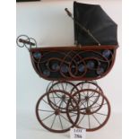 A decorative Victorian-style Dolls Pram, 90cm high,