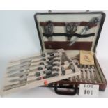 A cased set of stainless steel kitchen knives and six steak knives and forks, in as new condition,