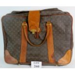 A Louis Vuitton travel case, 65cm wide, 50cm high, (a/f),