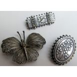 Chester 1890 silver brooch, a filigree brooch in the shape of a butterfly and on other,