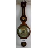 A 19th century mahogany cased wheel barometer, thermometer,
