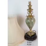 A table lamp with a polished marble baluster shaped form,