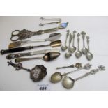 An interesting lot of plated items, to include stilton scoops, grape scissors,