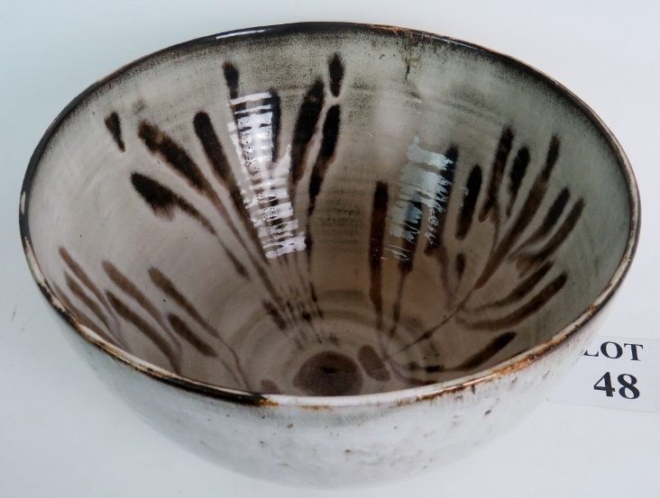 Large studio pottery bowl with an abstract design in brown on a white ground, 34cm diameter,