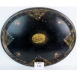 A large 19th century papier mache oval tray,