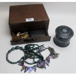 A good quality mahogany jewellery box with lower drawer containing a small amount of costume