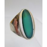 A silver ring inset with oval chrysoprase stone, size R,